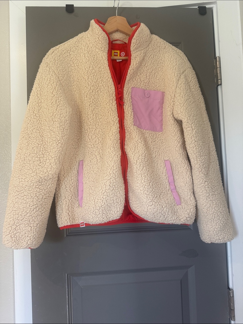 Target x LEGO Sherpa Zip Jacket with Pink Pocket Accents and Red Trim